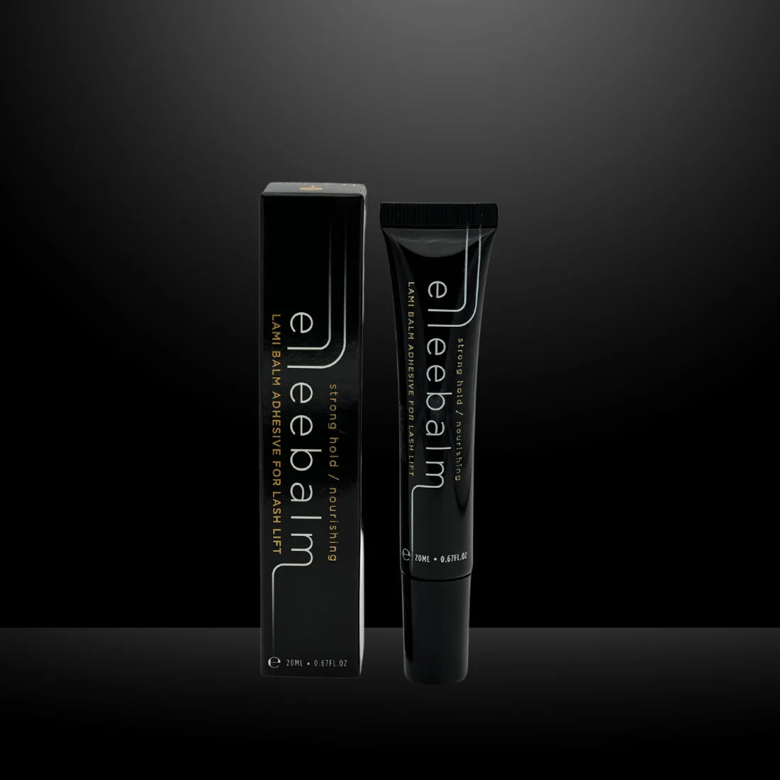 Elleebalm eyelash adhesive packaging on a black background