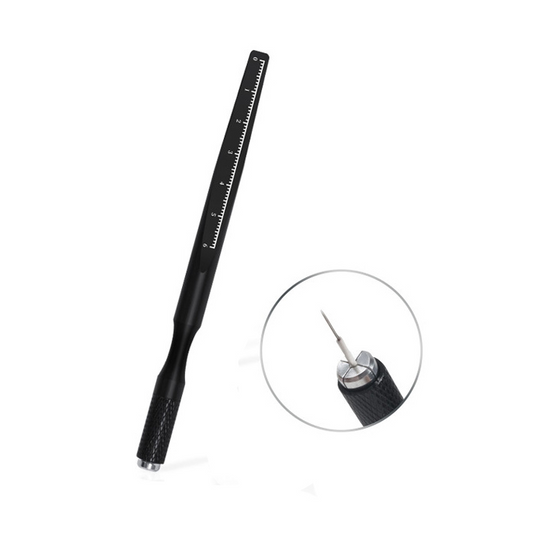 Black tool with ruler scale on a white background